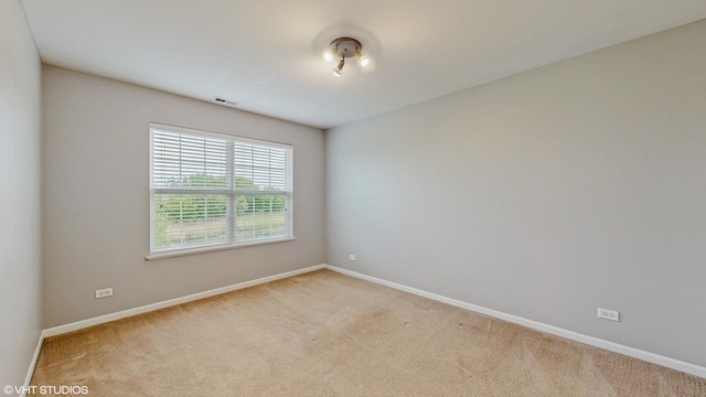 127 Charleston Ln, Gilberts, IL 60136 - carpeted spare room with baseboards