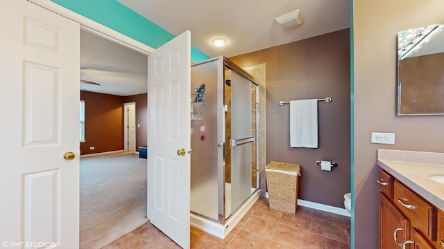 127 Charleston Ln, Gilberts, IL 60136 - full bathroom featuring vanity, baseboards, a shower stall, and toilet