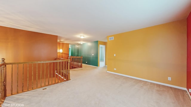 127 Charleston Ln, Gilberts, IL 60136 - empty room featuring carpet floors and baseboards