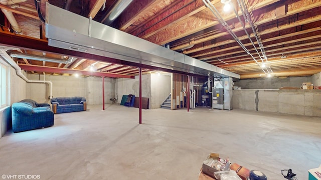 127 Charleston Ln, Gilberts, IL 60136 - unfinished basement with stairway and heating unit