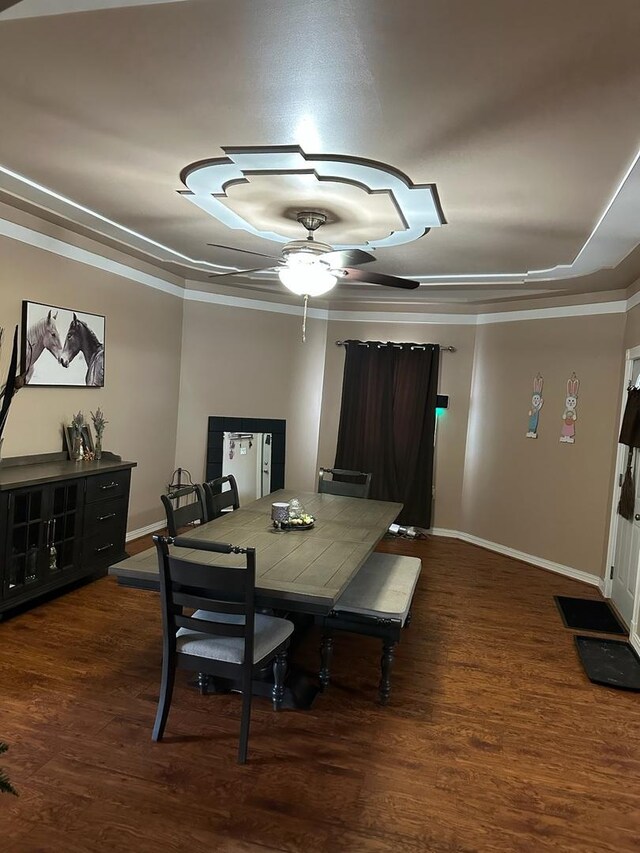 1028 Elizabeth St, Joliet, IL 60435 - dining space with baseboards, ceiling fan, ornamental molding, and wood finished floors
