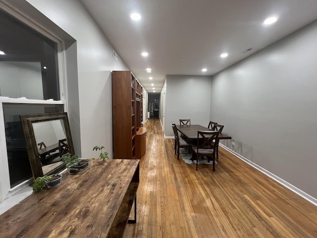 4909 N Avers Ave Unit 3, Chicago, IL 60625 - dining room with hardwood / wood-style floors, recessed lighting, a fireplace, and baseboards