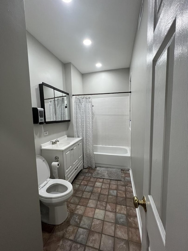 4909 N Avers Ave Unit 3, Chicago, IL 60625 - full bathroom featuring toilet, stone finish floors, vanity, shower / tub combo, and recessed lighting