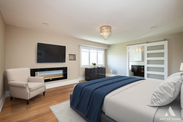 7902 W 105th St, Palos Hills, IL 60465 - interior space featuring hardwood / wood-style floors, visible vents, a chandelier, and baseboards