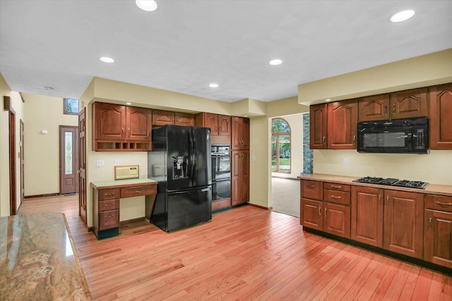1801 Bentbrook Dr, Champaign, IL 61822 - kitchen featuring black appliances, light wood-type flooring, and recessed lighting