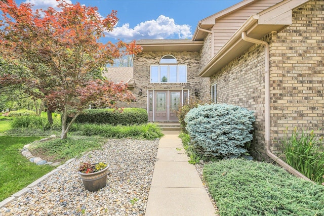 1801 Bentbrook Dr, Champaign, IL 61822 - view of exterior entry featuring brick siding