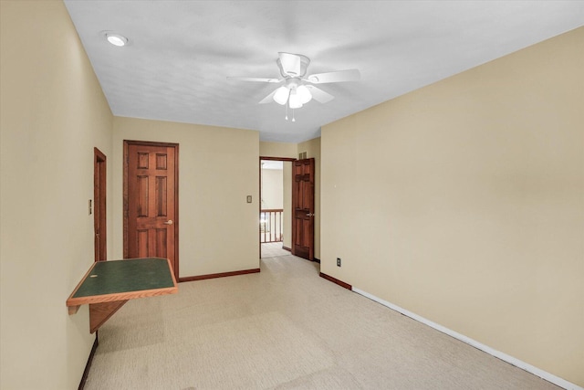 1801 Bentbrook Dr, Champaign, IL 61822 - unfurnished room featuring baseboards, ceiling fan, and light carpet