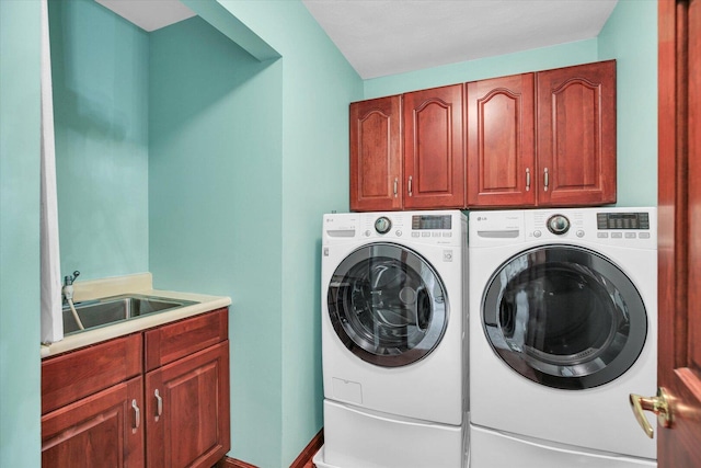 1801 Bentbrook Dr, Champaign, IL 61822 - laundry room with cabinet space, independent washer and dryer, and baseboards