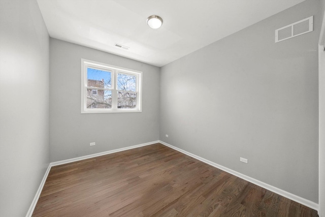 2200 N Kildare Ave, Chicago, IL 60639 - spare room featuring visible vents and baseboards