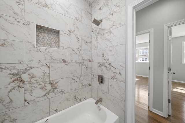 2200 N Kildare Ave, Chicago, IL 60639 - full bathroom featuring wood finished floors, baseboards, and washtub / shower combination