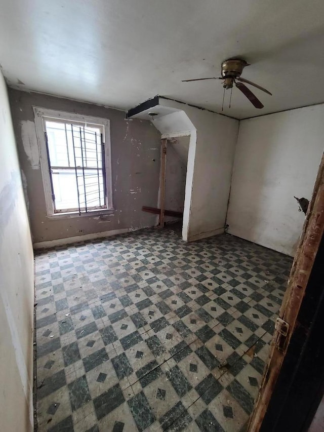 10452 S State St, Chicago, IL 60628 - bonus room with tile patterned floors and a ceiling fan