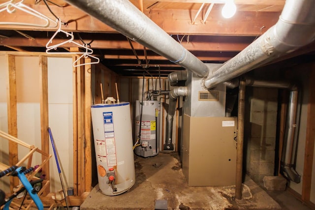 utilities featuring water heater and heating unit