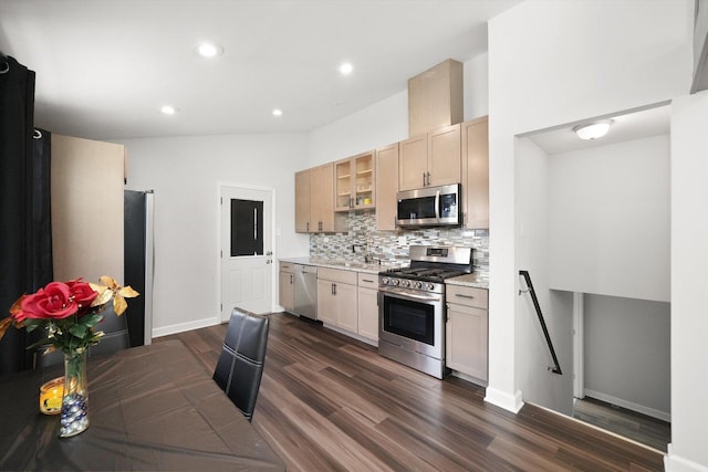 2708 Oxford Dr, Markham, IL 60426 - kitchen featuring dark wood-style floors, glass insert cabinets, baseboards, tasteful backsplash, and appliances with stainless steel finishes