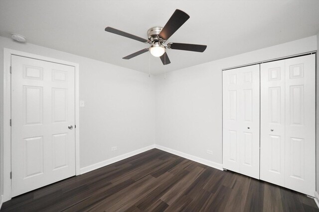 2708 Oxford Dr, Markham, IL 60426 - unfurnished bedroom with baseboards, a closet, ceiling fan, and dark wood finished floors