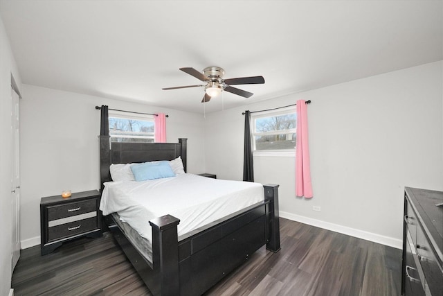 2708 Oxford Dr, Markham, IL 60426 - bedroom featuring baseboards, dark wood-style flooring, and multiple windows