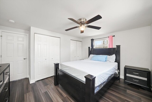 2708 Oxford Dr, Markham, IL 60426 - bedroom with two closets, a ceiling fan, baseboards, and dark wood-style flooring