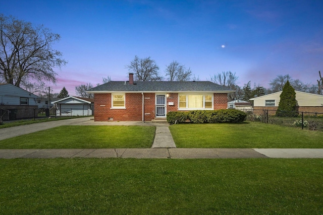 2708 Oxford Dr, Markham, IL 60426 - view of front facade with a chimney, concrete driveway, fence, a yard, and brick siding