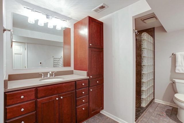 16737 W Cherrywood Ln, Wadsworth, IL 60083 - full bath with vanity, tile patterned flooring, toilet, tiled shower, and visible vents
