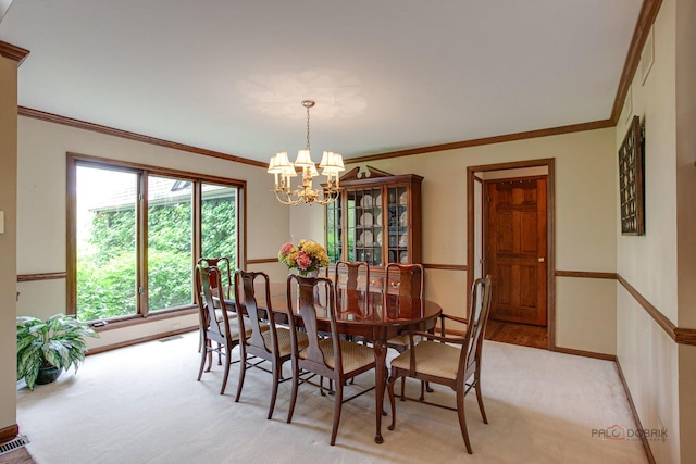 16737 W Cherrywood Ln, Wadsworth, IL 60083 - dining room with a chandelier, crown molding, and light carpet
