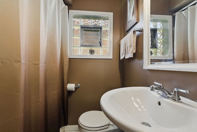 bathroom with a sink and toilet