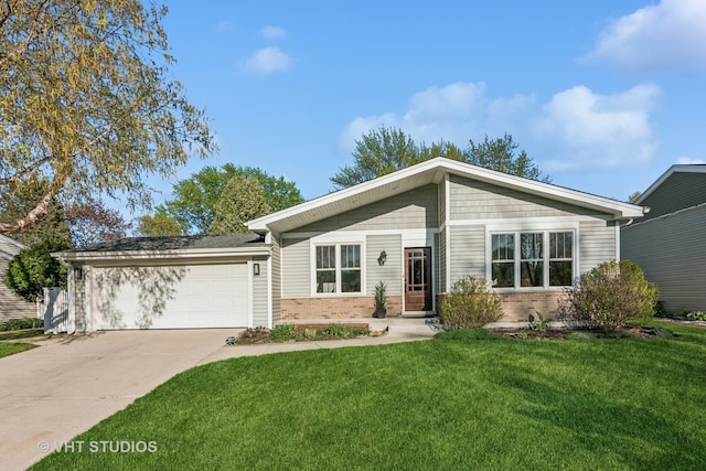 view of front of home featuring a front yard, brick siding, driveway, and an attached garage
