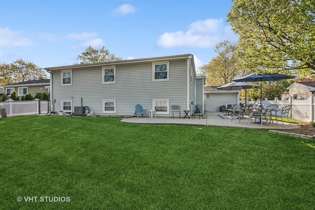 back of property with a patio and central AC unit
