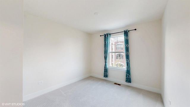 405 Filson St, La Grange, IL 60525 - carpeted empty room with visible vents and baseboards