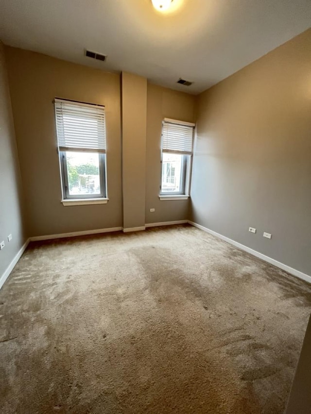 3920 N Sheridan Rd Unit 508, Chicago, IL 60613 - carpeted empty room featuring baseboards