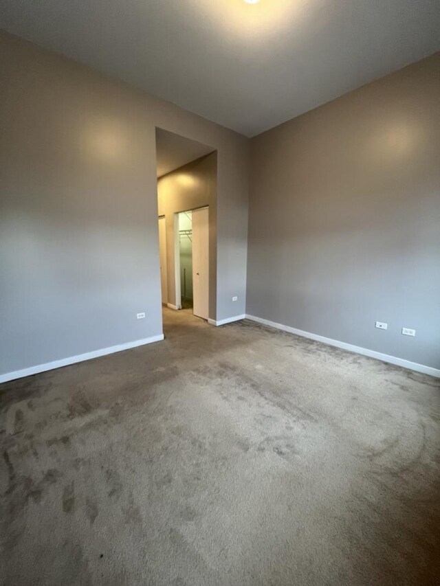3920 N Sheridan Rd Unit 508, Chicago, IL 60613 - empty room featuring baseboards and carpet