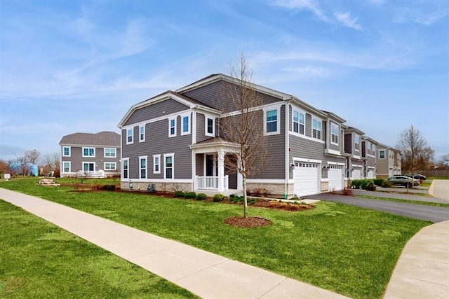 view of front facade with an attached garage, stone siding, a residential view, driveway, and a front lawn