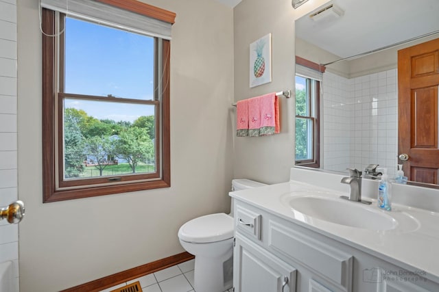 bathroom featuring tile patterned flooring, visible vents, toilet, vanity, and walk in shower