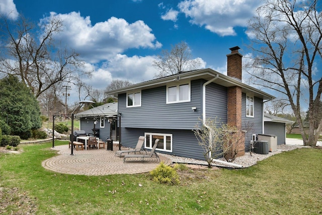 1167 Timberlane Ct, Naperville, IL 60540 - rear view of property featuring a chimney, a patio area, a gazebo, central AC, and a yard