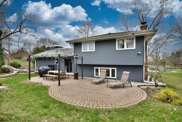 1167 Timberlane Ct, Naperville, IL 60540 - rear view of property featuring a yard, a gazebo, a chimney, and a patio area