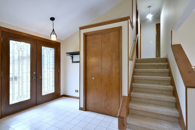 1167 Timberlane Ct, Naperville, IL 60540 - foyer entrance featuring stairway, vaulted ceiling, french doors, and light tile patterned flooring