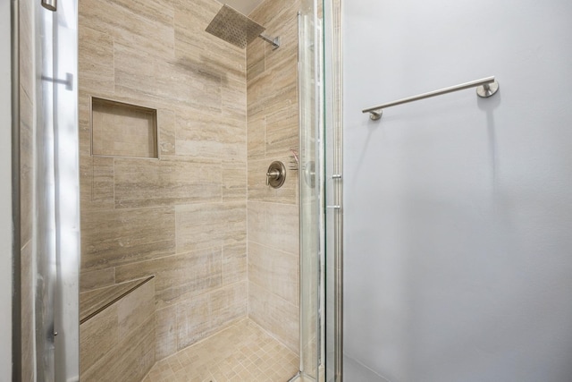 full bathroom featuring a stall shower