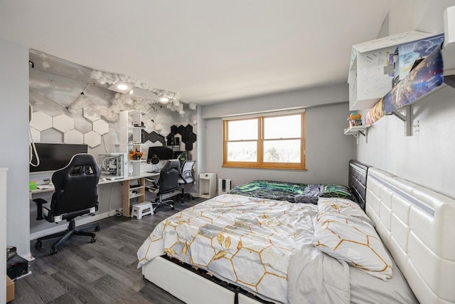bedroom featuring dark wood-style floors