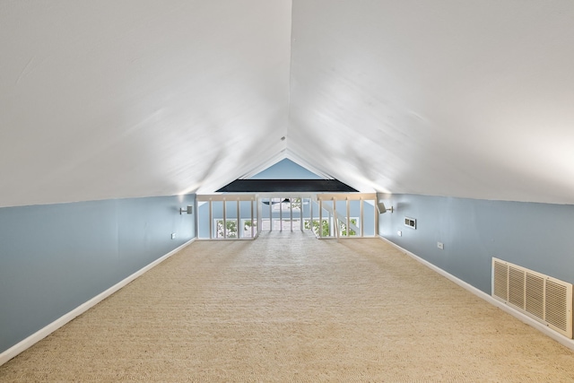 135 Cora Ave, Fox Lake, IL 60020 - additional living space with baseboards, vaulted ceiling, and carpet