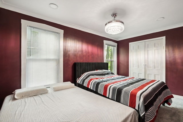 135 Cora Ave, Fox Lake, IL 60020 - carpeted bedroom with a closet and ornamental molding