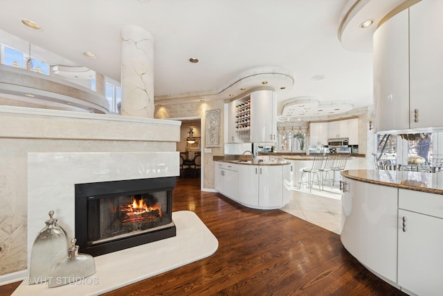 1525 Woodcrest Ct, Aurora, IL 60502 - carpeted cinema room featuring a ceiling fan
