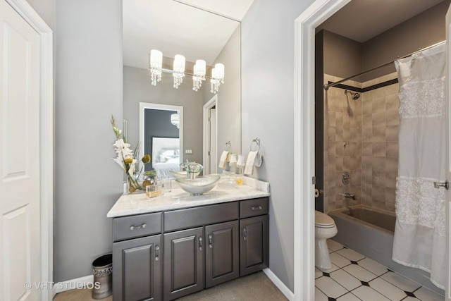 1525 Woodcrest Ct, Aurora, IL 60502 - carpeted bedroom featuring baseboards, a tray ceiling, a chandelier, and visible vents