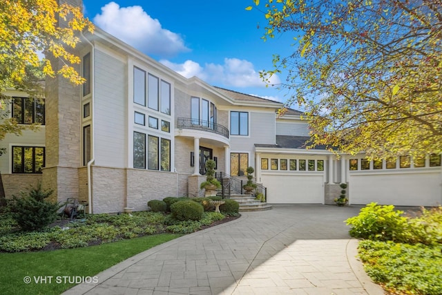 1525 Woodcrest Ct, Aurora, IL 60502 - view of front of home with brick siding, decorative driveway, and stone siding