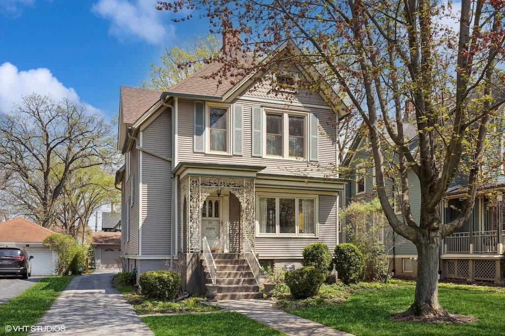 607 Thatcher Ave, River Forest, IL 60305 - victorian house with a shingled roof