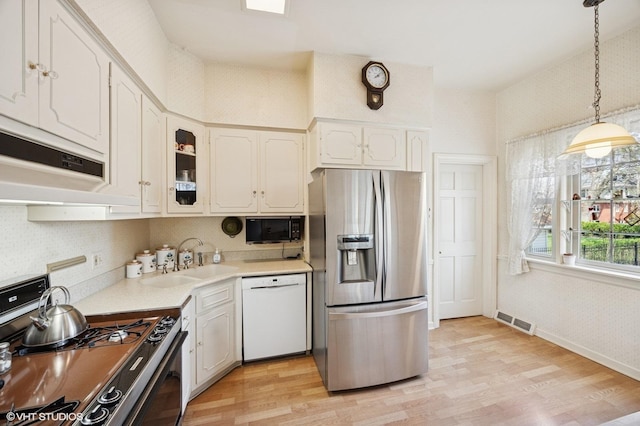 607 Thatcher Ave, River Forest, IL 60305 - kitchen featuring visible vents, stainless steel fridge, range with gas cooktop, a sink, and dishwasher