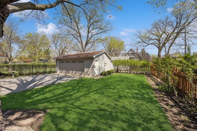 607 Thatcher Ave, River Forest, IL 60305 - view of yard featuring fence, an outbuilding, and a garage