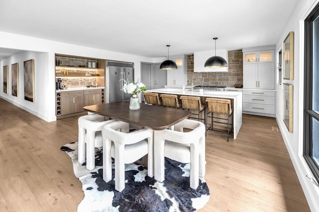 dining room featuring light wood-style floors