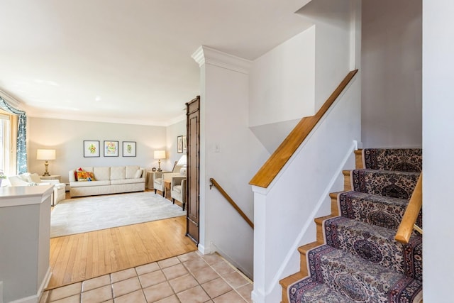 3528 Forest Ave, Wilmette, IL 60091 - stairway with baseboards, tile patterned flooring, and ornamental molding