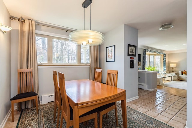 3528 Forest Ave, Wilmette, IL 60091 - dining area featuring baseboard heating, baseboards, and light tile patterned flooring