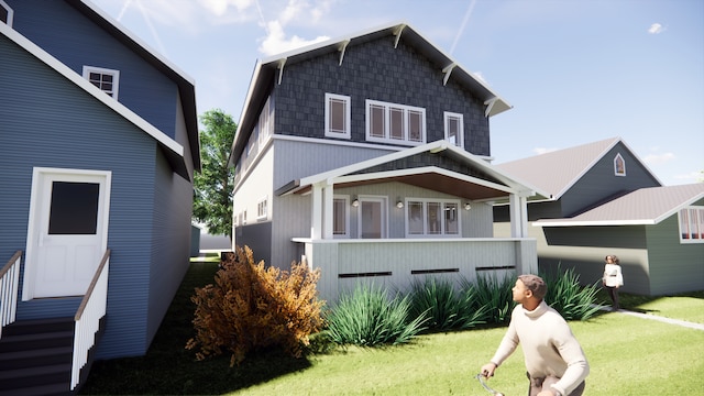 rear view of house featuring a lawn
