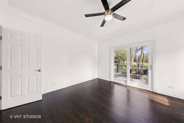 empty room with a ceiling fan, baseboards, ornamental molding, and wood finished floors