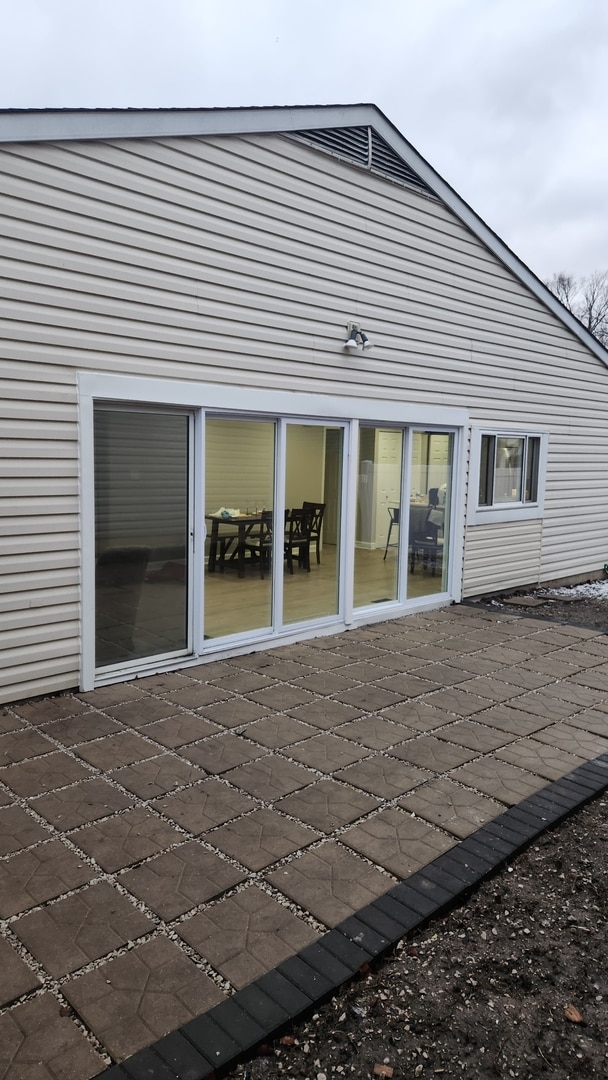 back of house with a patio area
